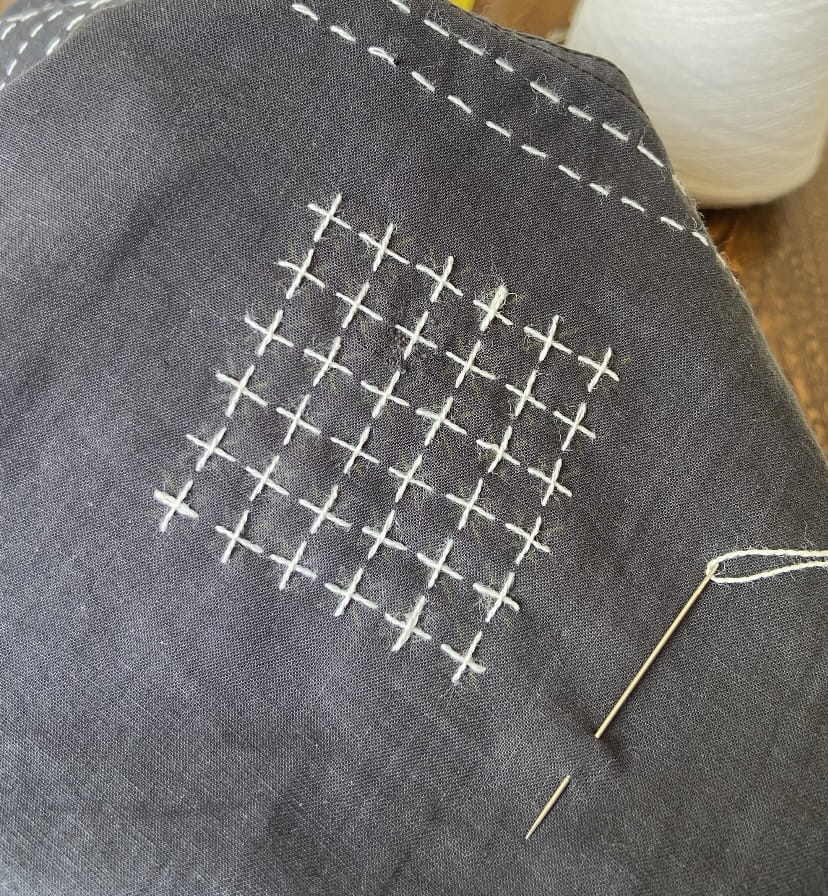 Broderie sur les points verticaux